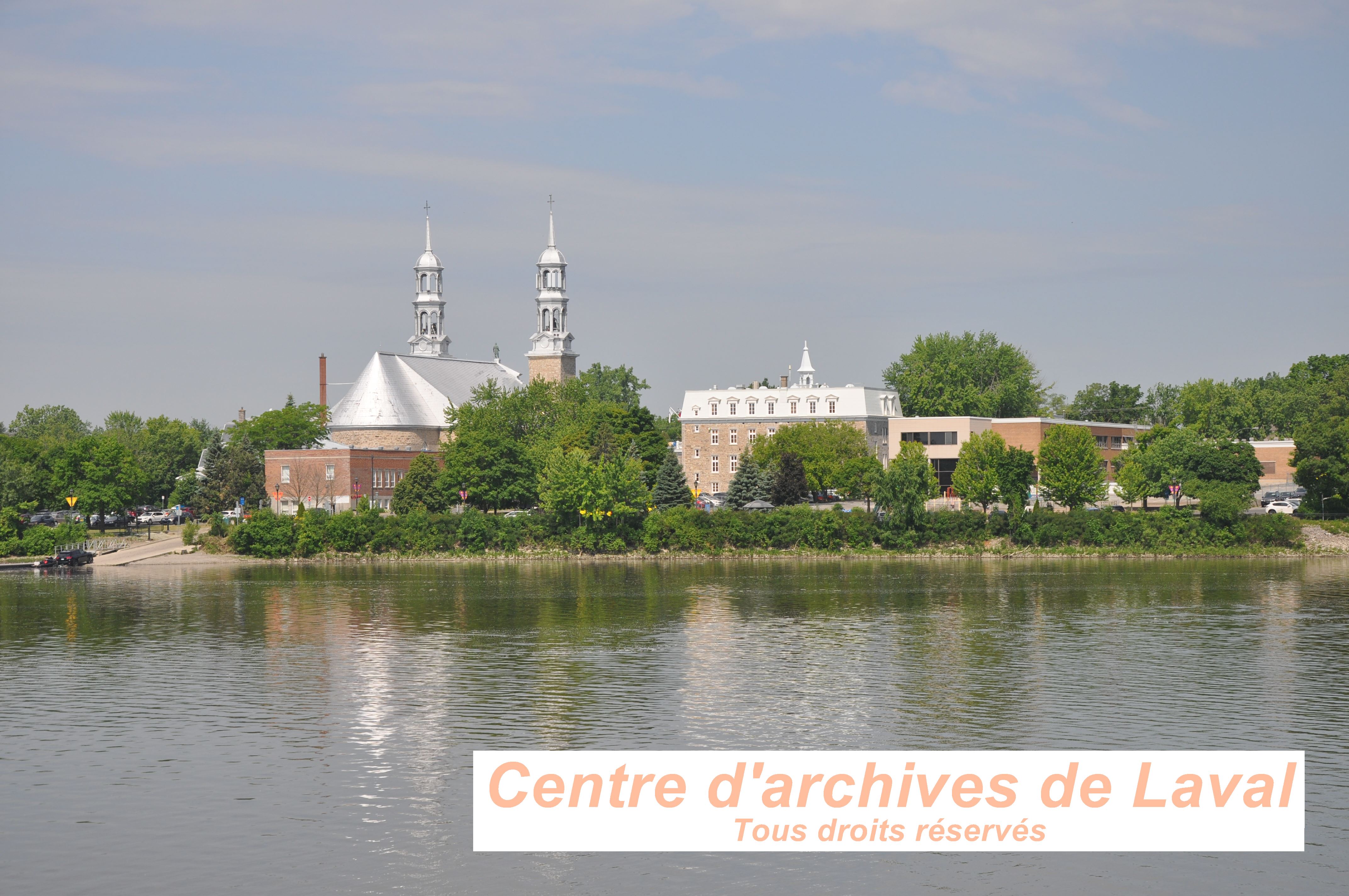 63 Photo de la ville de St-Eustache depuis le vestige du pont St-Eustache derrire le 2995 rue 2. Photo prise lors d'une visite guide, offerte aux employs et bnvoles du CAL et de la SHGIJ. Le tour tait anim par Franois Pilon le 6 juin 2024.