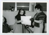 Une religieuse et une femme non identifies lors de clbrations en l'honneur de la Mre d'Youville  Saint-Benot en 1968.