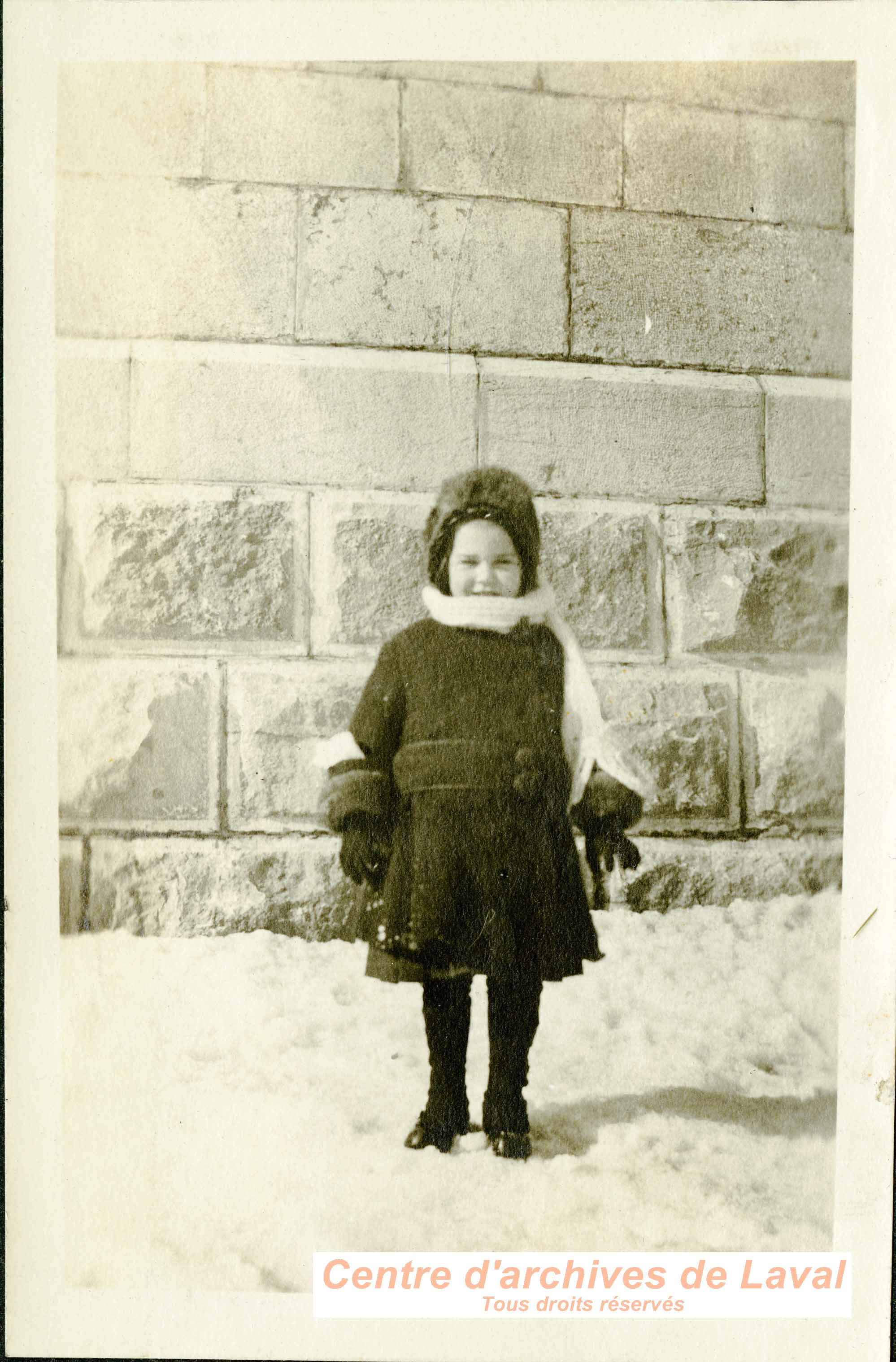 Enfant en hiver  Saint-Vincent-de-Paul.